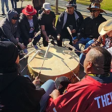 Choinumni tribe beating drum